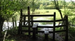 The stile into Short Wood where the Hutchison Way follows an old tramway linking the limestone workings in Short Wood with the limekilns in Limekiln Wood